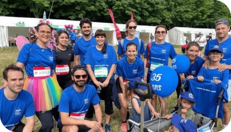 A group of people wearing blue shirts and holding signs pose for a picture. AI generated content