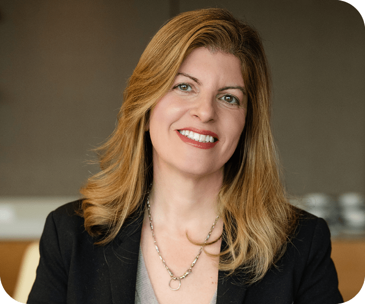 A woman in a suit and tie is smiling for the camera. AI generated content