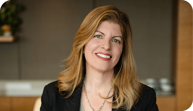 A woman in a suit and tie is smiling for the camera. AI generated content